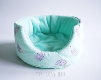 hedgehog bed, guinea pig bed, cosy cuddle cup, pet bed, fleece sofa, absorbent pee pad (hedgehogs on blue/pastel blue)