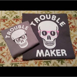Adult and child Trouble/Trouble Maker shirt combo