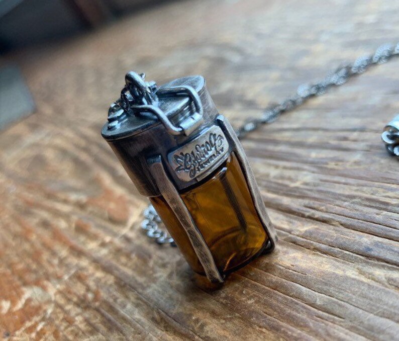 Brown Glass Caged Vial Functional Sterling keeper Locket with garnet Gemstone