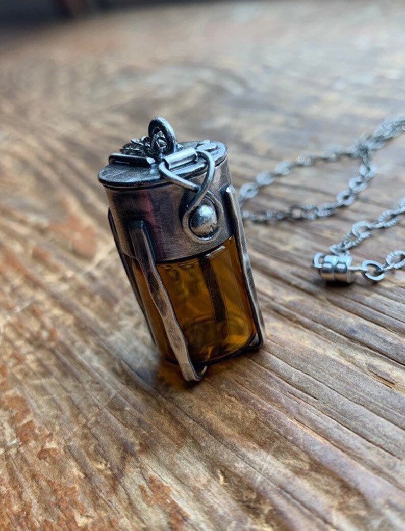Brown Glass Caged Vial Functional Sterling keeper Locket with garnet Gemstone