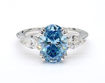 Blue diamond vivid color  center solitaire