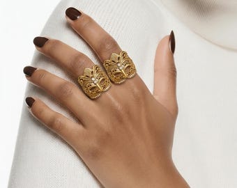 Statement ring , first king 18 karat yellow gold and 0.48 carats diamonds.