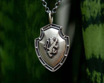 The knight shield sterling silver light patina with combination of polished and Matt finish 37mm 1,5” long
