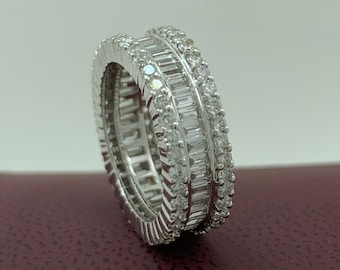 3,0 carats eternity natural diamond band combination of banquettes and round brilliant full cut in 18 karat white gold