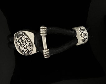 The unbroken seal king Tut Sterling silver and natural black double leather bracelet designed and made in our home in the USA Sal Knight ©