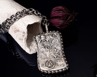 The Alchemist pendent antique finish written in secret true alchemy code and true Aramaic and true Ancient Greek sterling by Sal Knight ©