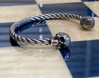 Cuff sterling silver rope wire with two skulls antique finish