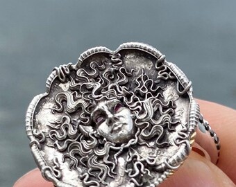 The Medusa ring in sterling silver and 18 karat yellow gold and rubies and black diamonds next day shipping