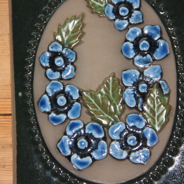 Wonderful blue floral Jie wall plaque in ceramic from Sweden