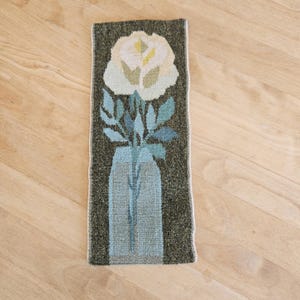 Beautiful handwoven wool wall tapestry with a yellow rose from Sweden