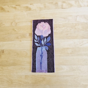 Beautiful handwoven wool wall tapestry with a pink rose from Sweden