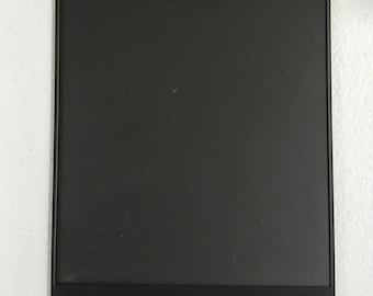 May include: A rectangular black magnetic board with a smooth, matte surface and a thin raised border frame. The design features a solid black finish across the entire front panel, providing a clean and uniform appearance for display purposes.