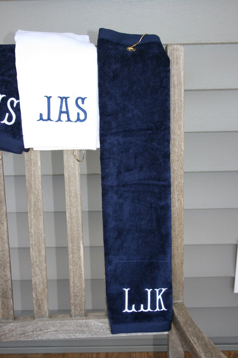 mens custom embroidered golf towels in navy and white
