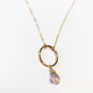 Karma hoop featuring a rose quartz tear drop stone on a 14k gold fill chain