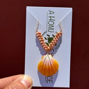 V-shaped  Kahelelani shell necklace featuring a Kauai sunrise shell