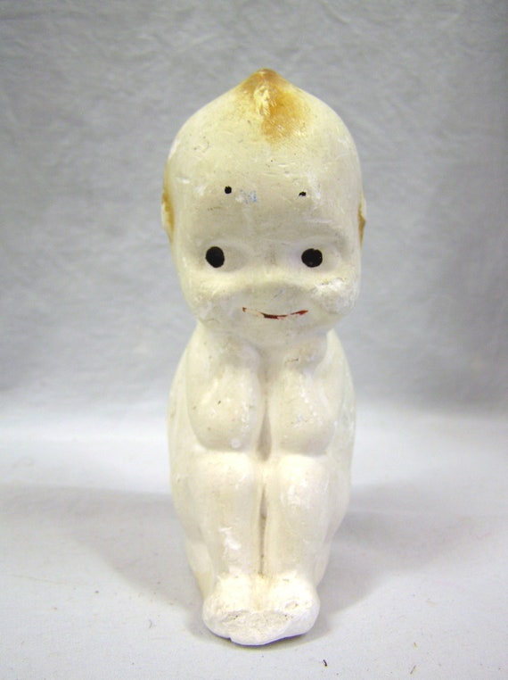 chalkware kewpie doll