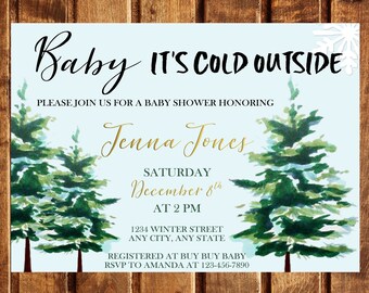 May include: A blue and white baby shower invitation with a winter theme. The invitation features two watercolor pine trees and the text "Baby It's Cold Outside". The invitation also includes the name "Jenna Jones", the date "December 8th", and the time "2 PM".