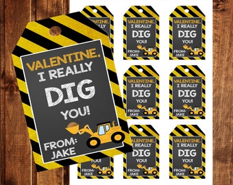 May include: Nine printable Valentine's Day gift tags featuring a yellow construction vehicle with the text "Valentine. I really dig you! From: Jake"