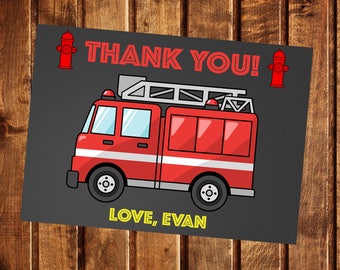 May include: A red fire truck with a ladder on top and a yellow "THANK YOU!" message. Two red fire hydrants are on either side of the message. The text "LOVE, EVAN" is at the bottom of the card.
