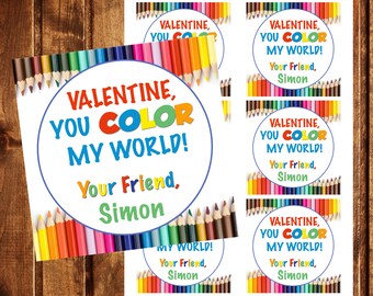 May include: A set of six Valentine's Day gift tags featuring a colorful array of crayons and the text "Valentine, You Color My World! Your Friend, Simon".