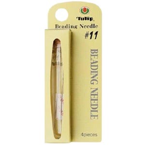 May include: A package of Tulip beading needles, size #11. The package is light yellow with the Tulip logo and the words "Beading Needle" printed on it. The package contains 4 pieces.