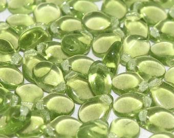Preciosa Pip™ OVALINE GREEN TRANSLUCENT pip beads, 5x7mm, 50 beads, clear hanging tube