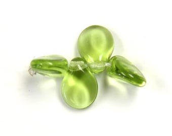 Preciosa Pip Beads: Ovaline Green Translucent Czech Glass, 5x7mm, 50pc
