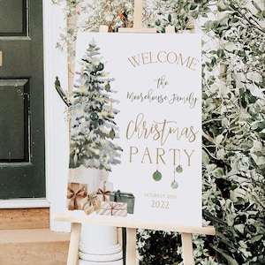 Elegant Christmas tree welcome sign for holiday parties, editable in Corjl. The printable Christmas sign features a green watercolor tree with lights, ornaments, and gift boxes, customized with family name and event date. Displayed outdoors on a wood easel in front of a green door surrounded by greenery, the mockup highlights how beautiful this editable Christmas party sign looks when welcoming guests to a cozy winter gathering.