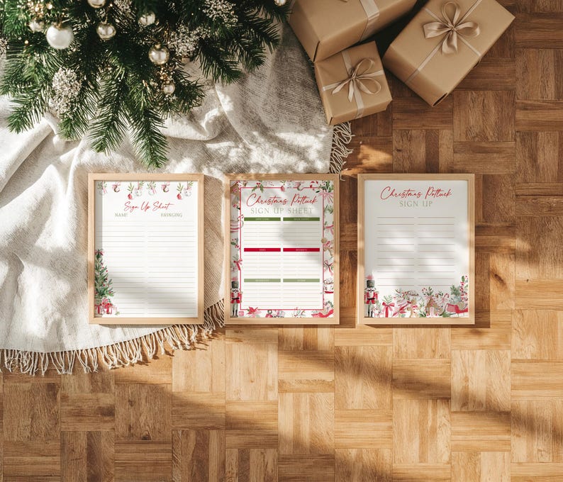 May include: Three rectangular wooden frames containing printed Christmas potluck sign-up sheets. The sheets feature festive watercolor illustrations of nutcrackers, Christmas trees, gifts, and ornaments with text reading Christmas Potluck Sign Up.