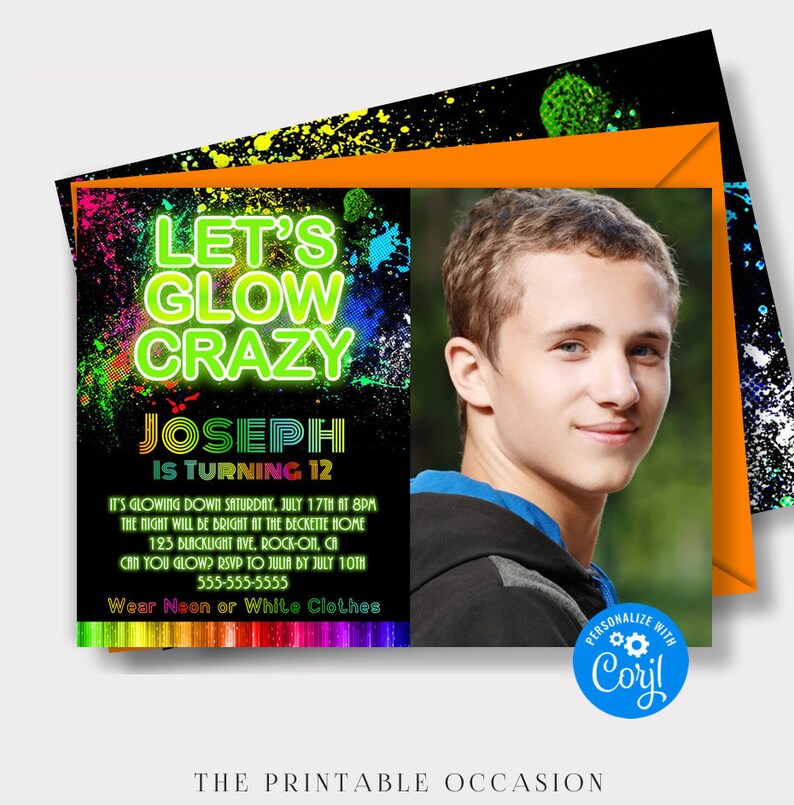 Glow birthday invitation for boys featuring bright neon green lettering, colorful paint splatters and a photo area for the birthday boy. The black background is accented with vivid green, yellow, blue and orange for a glow in the dark party look. The invitation is displayed at an angle with an orange envelope behind it. A round blue badge highlights the cool glow party theme.