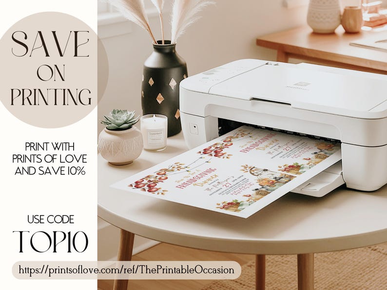 May include: A white printer printing a colorful invitation with floral and fruit illustrations. The invitation is for a Thanksgiving dinner. A black vase, a succulent, and a candle are on the table. Text on the left says "SAVE ON PRINTING".