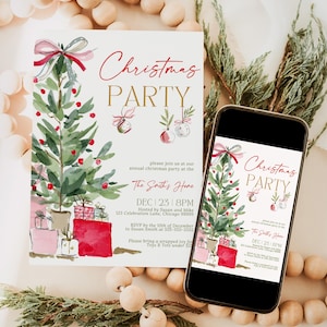 Elegant watercolor Christmas party invitation featuring a greenery Christmas tree with red berries, pink ribbon, hanging ornaments and wrapped gifts. Red script and gold lettering create a festive holiday design. Printed invitation is displayed beside a smartphone showing the matching digital invite. Soft ivory background with natural wooden beads and evergreen branches creates a modern Christmas stationery presentation.