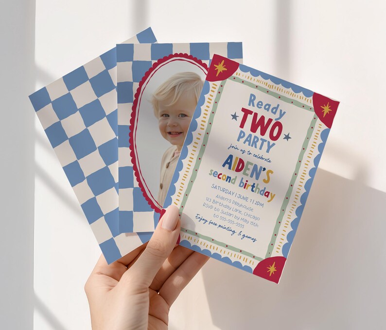 May include: A rectangular birthday invitation card featuring a blue and white checkered pattern, a photograph of a child inside a red scalloped oval frame, and text reading Ready TWO PARTY, Aiden's second birthday, with event details and star icons.