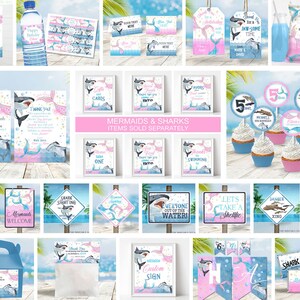 May include: A set of printable party decorations for a mermaid and shark themed birthday party. The set includes invitations, cupcake toppers, welcome signs, food labels, and a banner. The colors are pink, blue, and green.