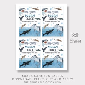 May include: Printable 8x11 inch sheet of four shark-themed Capri Sun labels. Each label features a blue watercolour background with sharks, fish, and bubbles. The text on the labels reads "JAW-SOME ocean JUICE drink at your own risk".