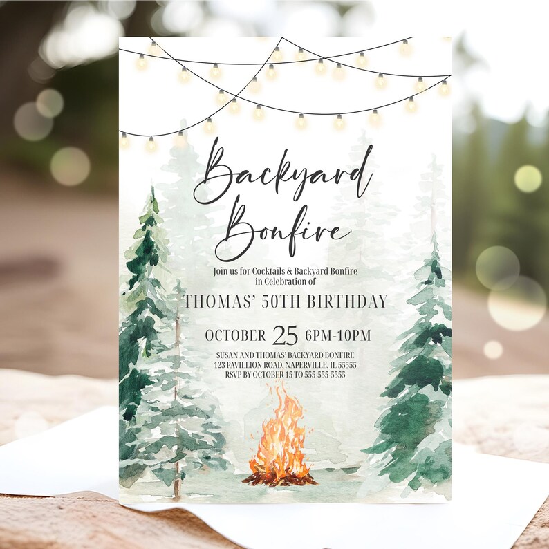 May include: Invitation for a backyard bonfire party. The invitation features a watercolor design with pine trees, a bonfire, and string lights. The text reads "Backyard Bonfire" and includes event details for Thomas' 50th birthday.
