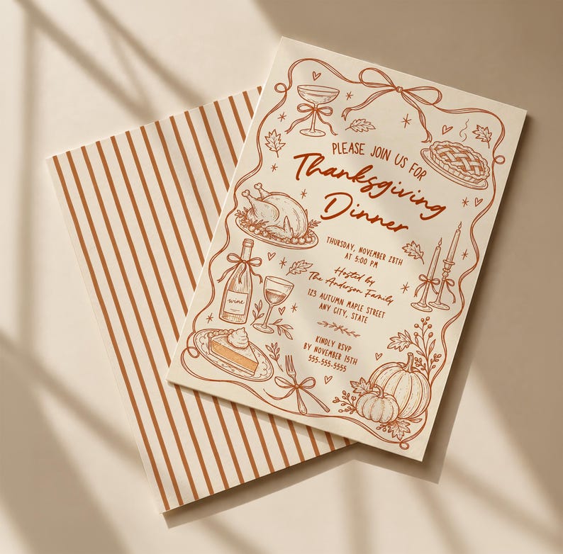 Hand drawn Thanksgiving dinner invitation shown with its coordinating striped backside on a warm cream surface. The design features brown line art with turkey, pie, pumpkins, wine, candles, bows and autumn leaves. Soft window shadows give the scene a warm Thanksgiving feel. Both the illustrated invitation front and matching striped reverse are visible.