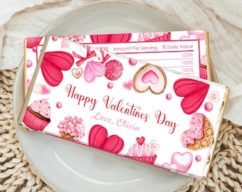 May include: Two Valentine's Day chocolate bars with pink and red watercolor illustrations of hearts, cupcakes, and candies. The bars are decorated with the text "Happy Valentines Day, Love, Olivia."