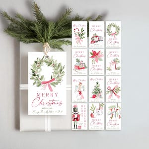 May include: A collection of rectangular Christmas gift tags featuring watercolor illustrations of holiday motifs including wreaths, a train, a poinsettia, a sleigh, an angel, a tree, a nutcracker, and ornaments, with the text Merry Christmas.
