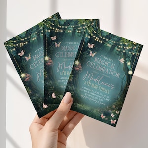A set of enchanted forest birthday invitations printed and ready to share, highlighting the fairy garden woodland party theme. This girls birthday invitation features fairy lights, butterflies, and glowing enchanted details. Editable in Canva, this magical forest invite is ideal for woodland birthday parties.