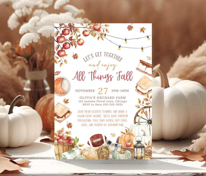 Editable fall gathering invitation featuring rustic watercolor autumn illustrations including pumpkins, apples, hay bale, lantern and falling leaves around the All Things Fall title. The editable party information appears clearly in the center of the design. The invitation is displayed beside a smartphone showing the digital version on screen, demonstrating how the design can be shared electronically.