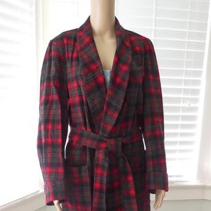 May include: A rustic wooden sign with the text "Welcome to our home" in a handwritten style. The sign features a distressed finish and a simple, inviting design, perfect for a front porch or entryway.