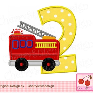 May include: A red fire truck with a yellow ladder and a white number two with yellow polka dots. The fire truck has three windows and a yellow and red light on top. The number two is behind the fire truck.