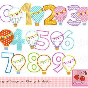 Puede incluir: Un conjunto de diez números de globos aerostáticos coloridos, cada uno con un patrón y un color diferente. Los números son perfectos para una fiesta de cumpleaños u otra celebración.