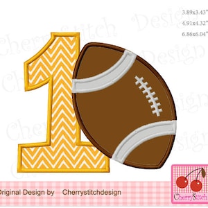 May include: A yellow number one with a chevron pattern and a brown football. The football has white laces and a white stripe around the middle.