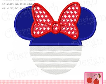 May include: Red, white and blue embroidered design of a Mickey Mouse head with a bow. The bow is covered in white stars on a red background. The ears are blue and the face is white with red and white stripes.