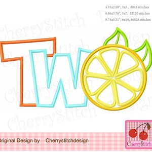 May include: Embroidered design of the word "TWO" in blue and orange with a yellow lemon slice and green leaves. The design is suitable for embroidery projects.