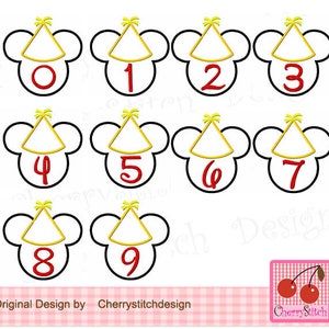 May include: Ten red numbers, 0 through 9, are displayed in a Mickey Mouse head shape with a yellow party hat on top. The numbers are outlined in black.