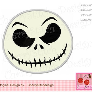 May include: Black and white embroidery design of Jack Skellington's face from the Nightmare Before Christmas film. The design is circular and features a stitched outline.