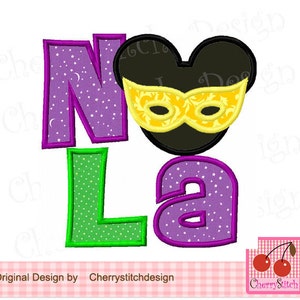 May include: A digital design featuring the letters "NOLA" in purple, green, and purple with a star pattern. A black Mickey Mouse head shape with a gold mask is above the "a". The design includes the text "Original Design by Cherrystitchdesign".